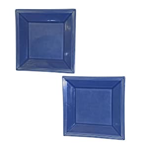 May include: Two square plates in a deep blue color with a glossy finish. Each plate features a raised, stepped rim design along the edges, creating a subtle border effect. The plates have a smooth, uniform surface and a distinct square shape.