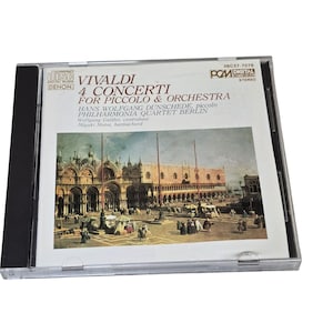 May include: A set of three ceramic mugs with a speckled, matte finish. The mugs are in shades of blue, green, and white. Each mug has a simple, modern design, perfect for coffee or tea.