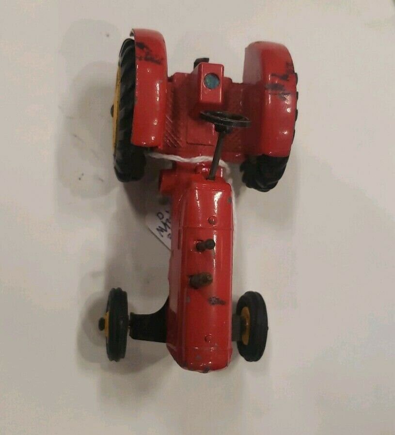 A boxed Dinky Toys No.300 Massey-Harris Tractor, M, box Ex pus with packing