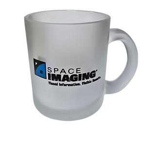 May include: A frosted glass mug with a curved handle. The mug features the text "SPACE IMAGING" in black and white, along with a blue and black logo. The text "Visual Information. Visible Results" is below the main text.