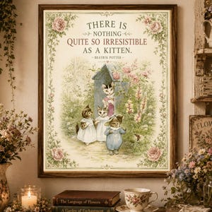 May include: A framed wall print featuring a Beatrix Potter quote, There is nothing quite so irresistible as a kitten, with an illustration of four kittens in a garden setting, surrounded by a decorative border of pink roses and green foliage.