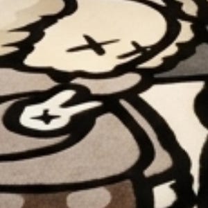 May include: A rectangular rug featuring a cartoon character with X-shaped eyes and a peace sign hand gesture. The character is rendered in shades of beige, gray, and black. The text "It gets better" is printed in bold black letters at the top.