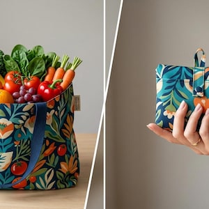 May include: A reusable tote bag filled with fresh produce, including apples, oranges, tomatoes, and carrots. The bag features a floral pattern in teal, orange, and navy. A matching, folded, compact bag is held in a hand.