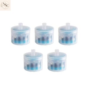 May include: A set of five cylindrical water filters with translucent white plastic casings. Each filter features a small central nozzle on the top and a visible interior core containing blue and dark-coloured filtration media components.