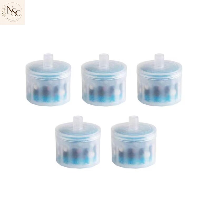 May include: A set of five cylindrical water filters with translucent white plastic casings. Each filter features a small central nozzle on the top and a visible interior core containing blue and dark-coloured filtration media components.