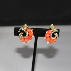 Gold Orange Clip On Earrings with Accents