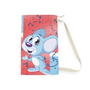 May include: A blue drawstring bag featuring a cartoon mouse character with large ears and purple eyes. The bag has a red background with blue splatters and a cream-colored strap.