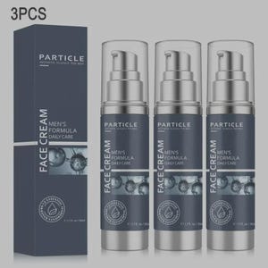 May include: Three bottles of Particle Men's Formula Daily Care Face Cream are displayed next to a matching box. The bottles have silver pumps and dark blue labels with white text. The box is dark blue with the brand name and product information.