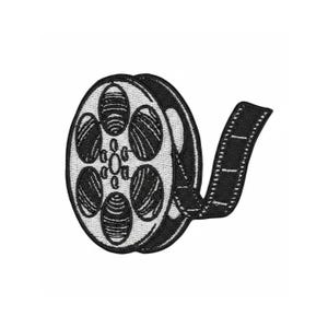 May include: Embroidered patch featuring a black and white film reel. The reel has a detailed design with oval-shaped openings and a black film strip extending from the side. The patch is likely for application on clothing or accessories.