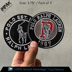 May include: Two round embroidered patches featuring the Polo Ralph Lauren logo. One patch is black with a white logo and text, the other has a gray background with a red "P" and the logo. Each patch is 3.75 inches in diameter.