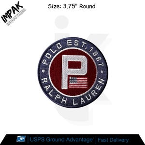 May include: A round embroidered patch with the text "POLO EST. 1967 RALPH LAUREN" encircling a red circle with a white "P" and an American flag. The patch is 3.75 inches in diameter.