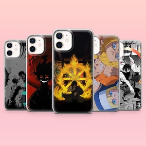 May include: A collection of five phone cases with various anime-themed designs. The cases feature vibrant illustrations of characters and symbols, including a fiery wheel, a smiling black figure, and other anime art. The cases are displayed against a pink background.
