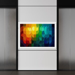 May include: A modern interior featuring two elevator doors with a colorful abstract art piece in a white frame. The artwork displays a vibrant spectrum of colors, including red, orange, yellow, green, and blue.