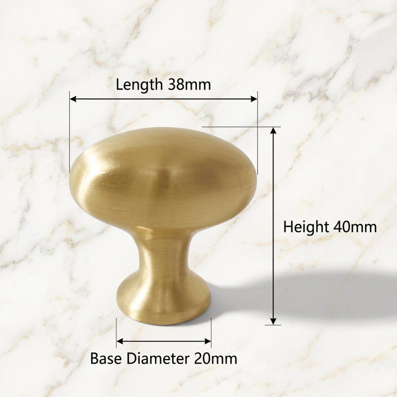 May include: A brushed gold cabinet knob with an oval top and a tapered base. The knob features technical labels indicating a length of 38mm, a height of 40mm, and a base diameter of 20mm, providing clear physical dimensions for the hardware piece.