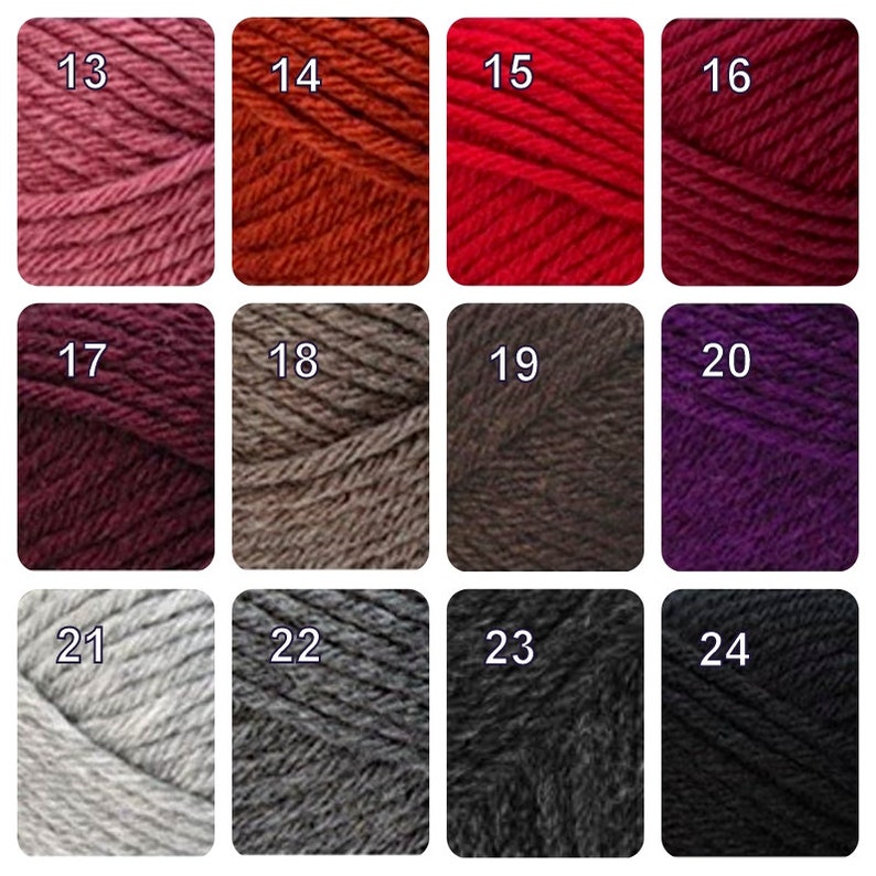 a bunch of different colors of yarn