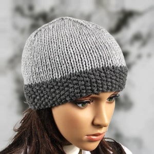 Hand knitted unisex beanie. A lovely hat for men and women available in grey.