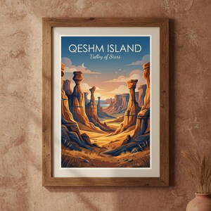 May include: Framed art print depicting Qeshm Island's Valley of Stars. The image shows towering rock formations in shades of orange and brown under a blue sky. The print is in a wooden frame, suitable for home decor.