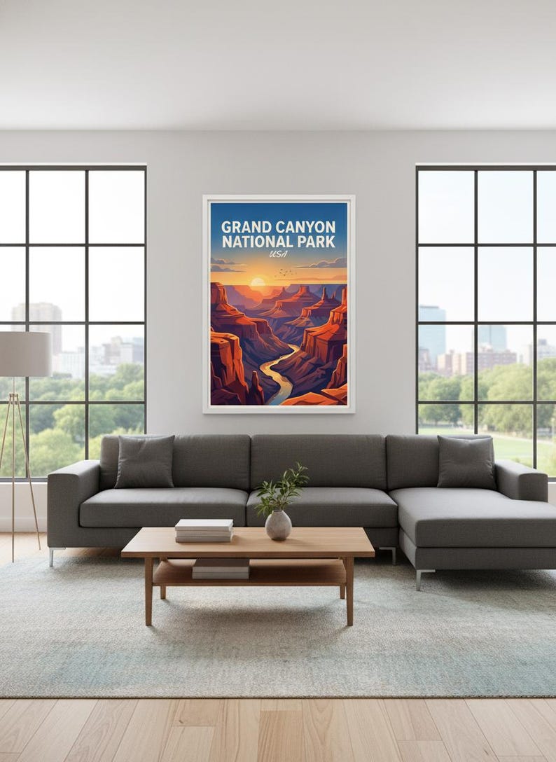 May include: A framed art print of the Grand Canyon National Park in the USA. The artwork depicts a vibrant sunset over the canyon, with the text "GRAND CANYON NATIONAL PARK USA" at the top. The print is displayed in a modern living room setting.