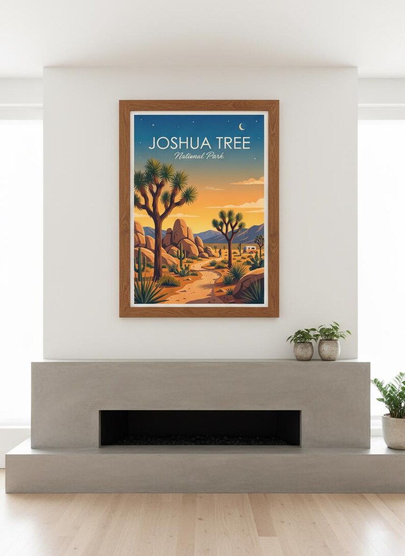 May include: Framed art print featuring a desert landscape with Joshua trees, rocks, and a path. The artwork has a warm color palette of orange, blue, and brown. The text "JOSHUA TREE National Park" is displayed at the top.