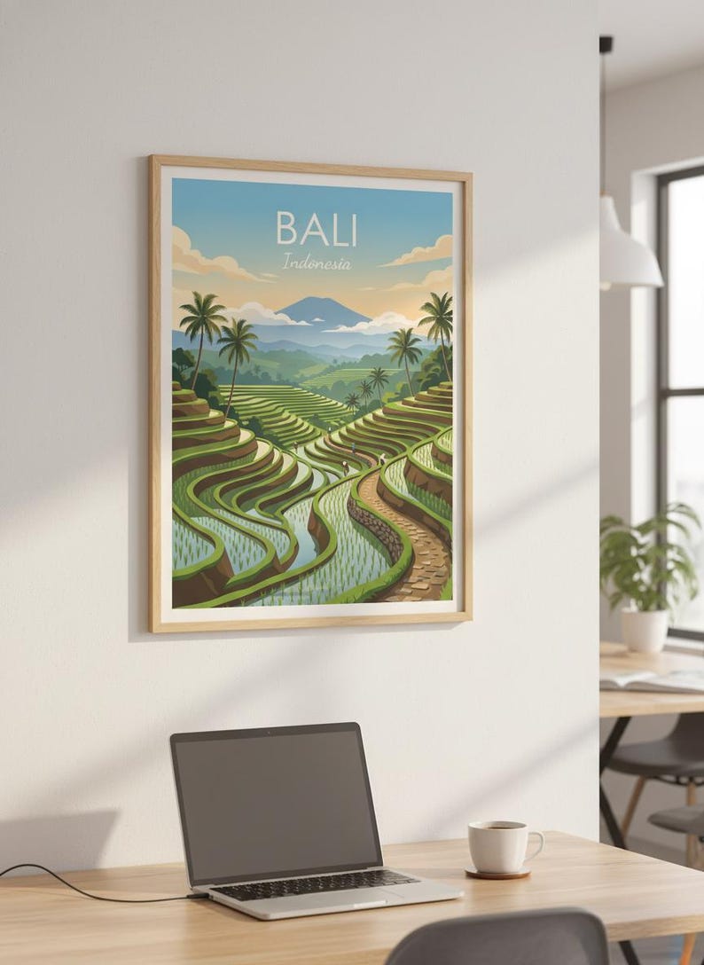 May include: A framed wall art print featuring a landscape illustration of Bali, Indonesia, with green terraced rice fields, palm trees, and a distant mountain under a blue sky. The text BALI Indonesia is printed in white at the top center.