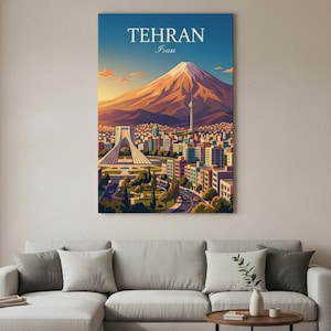 May include: A vibrant art print of Tehran, Iran, featuring a mountain, cityscape, and the Azadi Tower. The artwork has a warm color palette with a blue sky and the text "TEHRAN Iran" at the top. The print is displayed above a gray sectional sofa.