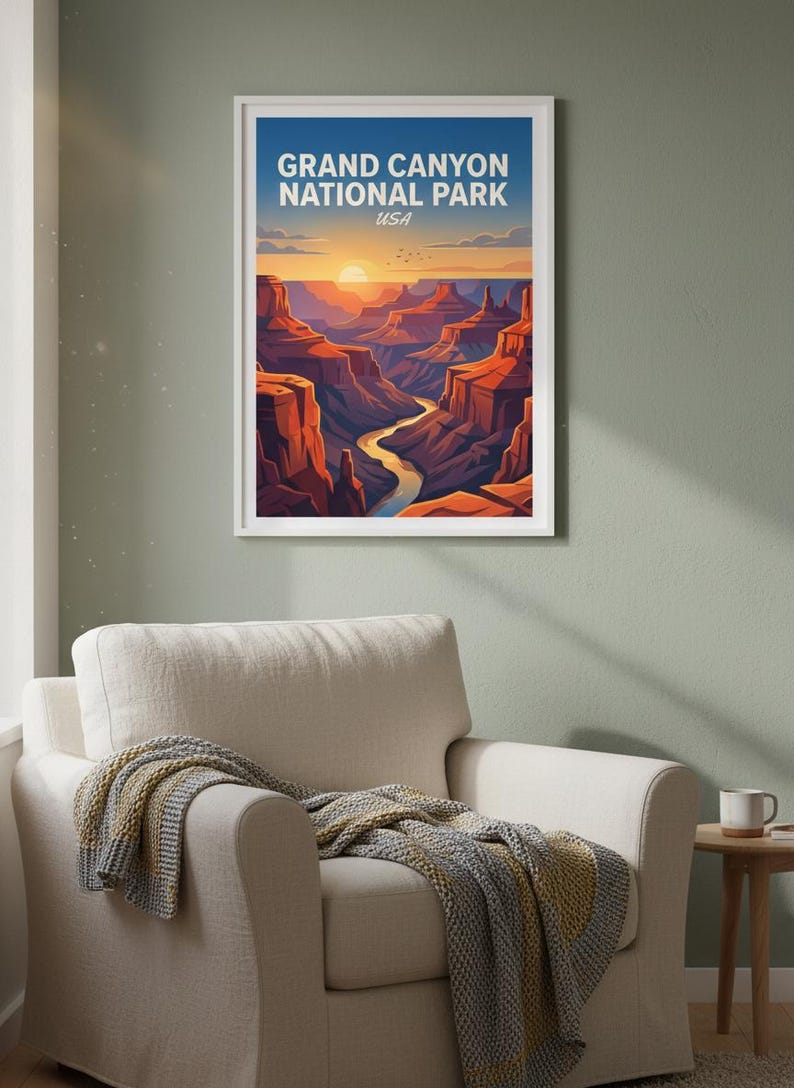 May include: A framed art print of the Grand Canyon National Park in the USA. The artwork depicts a stylized landscape with a river winding through red rock formations under a sunset sky. The print is in a white frame.