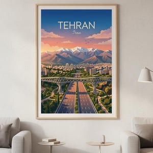 May include: A framed art print of Tehran, Iran. The image features a highway, city buildings, and mountains under a blue sky with the text "TEHRAN Iran". The artwork has a warm color palette.
