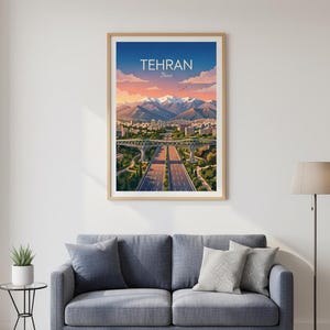 May include: A framed art print featuring a stylized illustration of Tehran, Iran. The artwork depicts a cityscape with a highway, bridge, and mountains under a sunset sky. The word "TEHRAN" is displayed at the top.