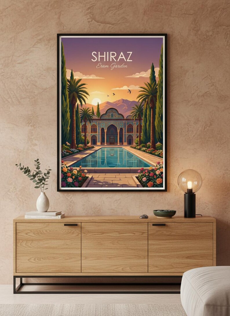 May include: A framed art print depicting the Eram Garden in Shiraz, Iran. The artwork showcases a serene pool, a detailed building, palm trees, and a sunset. The text "SHIRAZ Eram Garden" is displayed at the top.