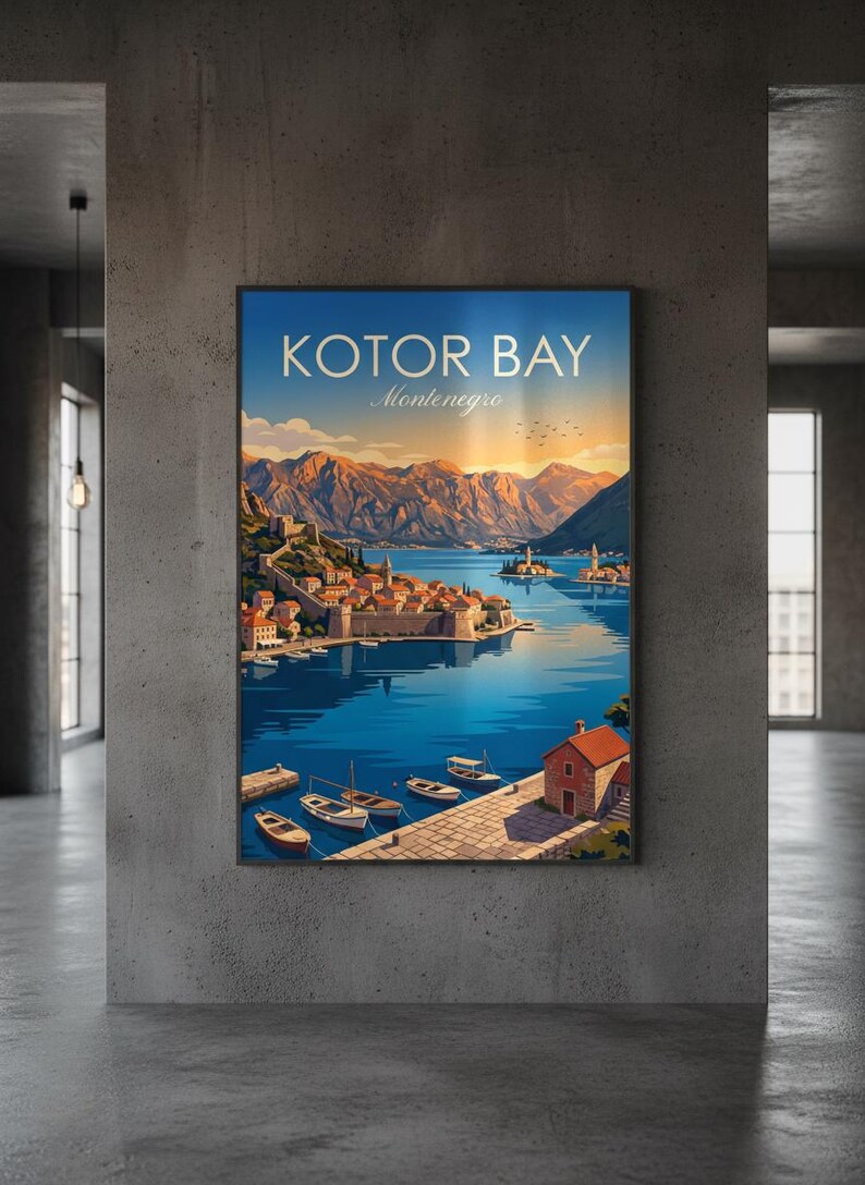 May include: A framed art print of Kotor Bay, Montenegro. The artwork depicts a coastal town with buildings, boats, and mountains under a blue sky. The text "KOTOR BAY Montenegro" is at the top of the print.