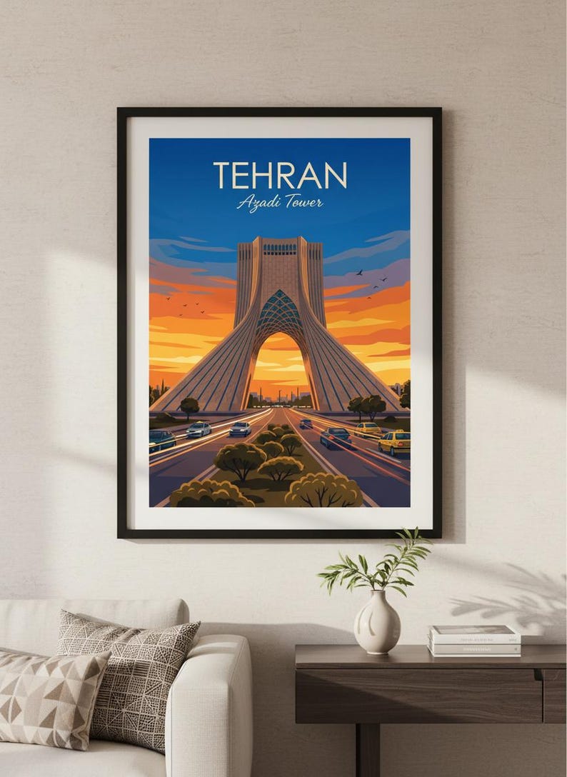 May include: A framed print depicting the Azadi Tower in Tehran, Iran, set against a sunset sky. The image shows the tower's distinctive design, with vehicles on the road. The text "TEHRAN Azadi Tower" is displayed at the top of the artwork.