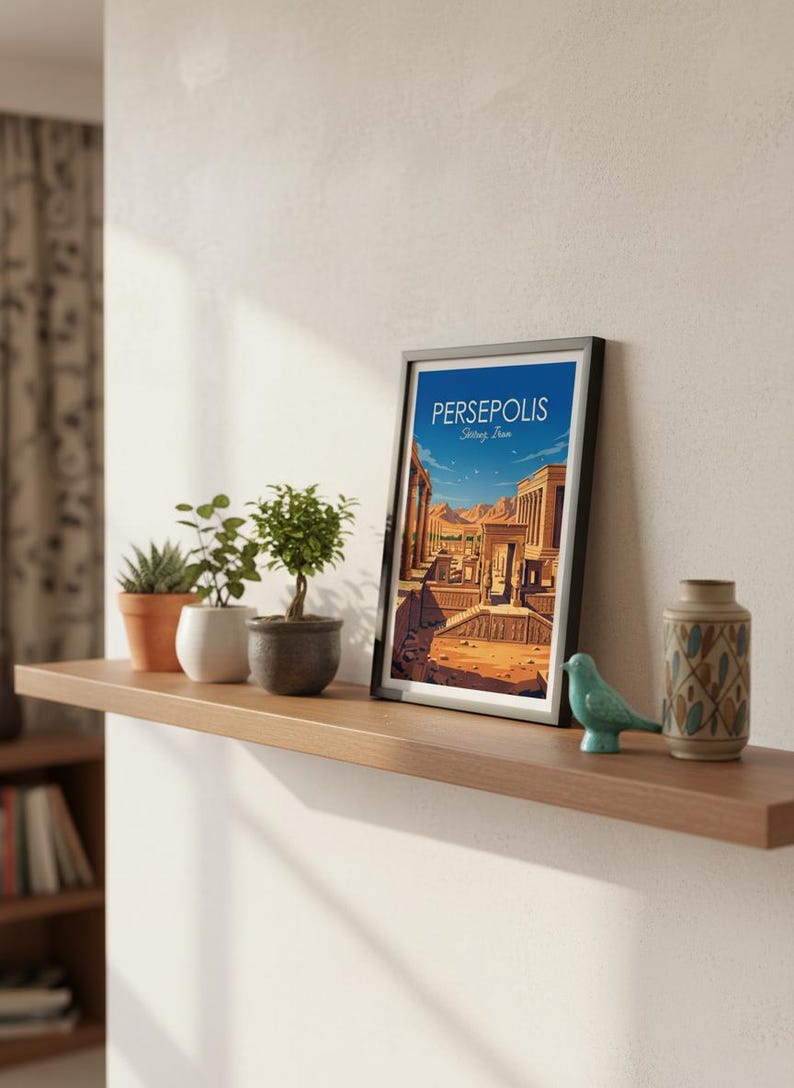 May include: A framed art print with the word "PERSEPOLIS" and "Shiraz, Iran" on the top. The print depicts an ancient city with columns and buildings. The print is on a wooden shelf with small potted plants, a teal bird figurine, and a decorative vase.