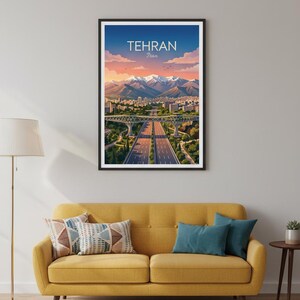 May include: A framed art print featuring a stylized illustration of Tehran, Iran. The artwork depicts a cityscape with highways, bridges, and snow-capped mountains under a blue sky with text that reads "TEHRAN Iran".