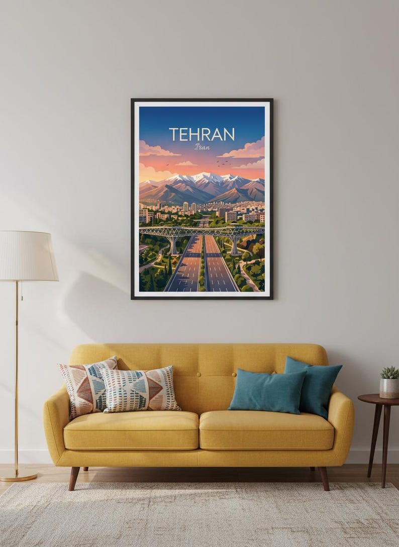 May include: A framed art print featuring a stylized illustration of Tehran, Iran. The artwork depicts a cityscape with highways, bridges, and snow-capped mountains under a blue sky with text that reads "TEHRAN Iran".