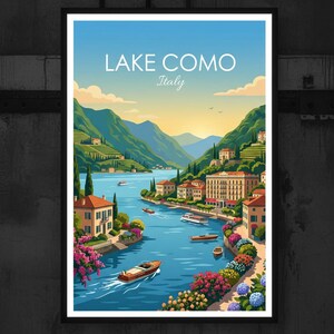 May include: A framed art print of Lake Como, Italy. The image shows a blue lake with boats, surrounded by green hills and buildings. The sky is blue and yellow. The text "Lake Como Italy" is at the top of the print. The artwork is set in a black frame.