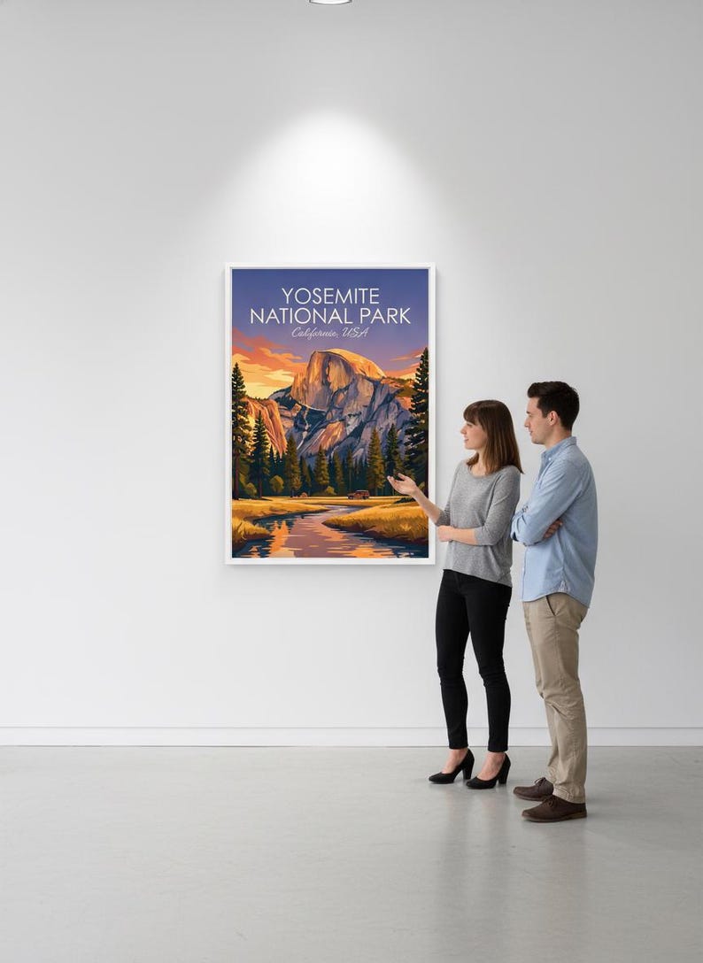 May include: A framed print of Yosemite National Park, California, USA. The artwork depicts a scenic landscape with a river, mountains, and trees under a sunset sky. The print is displayed on a white wall.