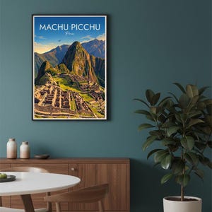 May include: A framed wall art print featuring a colorful illustration of the Machu Picchu ruins in Peru. The artwork displays stone structures, green terraces, and towering mountains under a blue sky with the text Machu Picchu Peru.