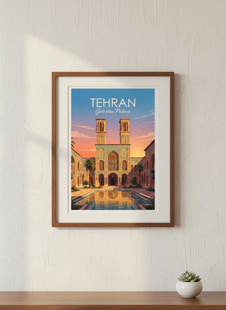 May include: Framed art print featuring the Golestan Palace in Tehran, Iran. The image showcases the palace with its two towers, a reflecting pool, and palm trees, set against a sunset sky. The text "TEHRAN Golestan Palace" is displayed at the top.