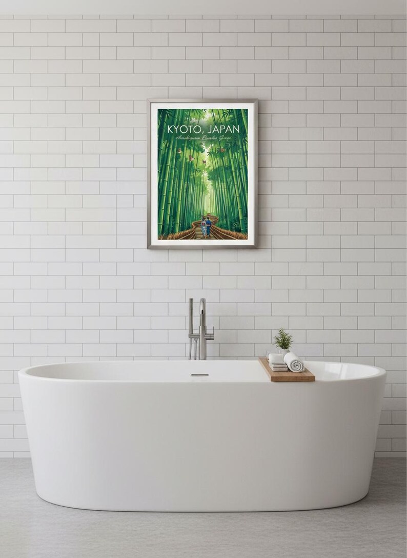 May include: Framed print featuring a vibrant depiction of the Arashiyama Bamboo Grove in Kyoto, Japan. The artwork showcases a path winding through towering green bamboo stalks, with the text "KYOTO, JAPAN" at the top.