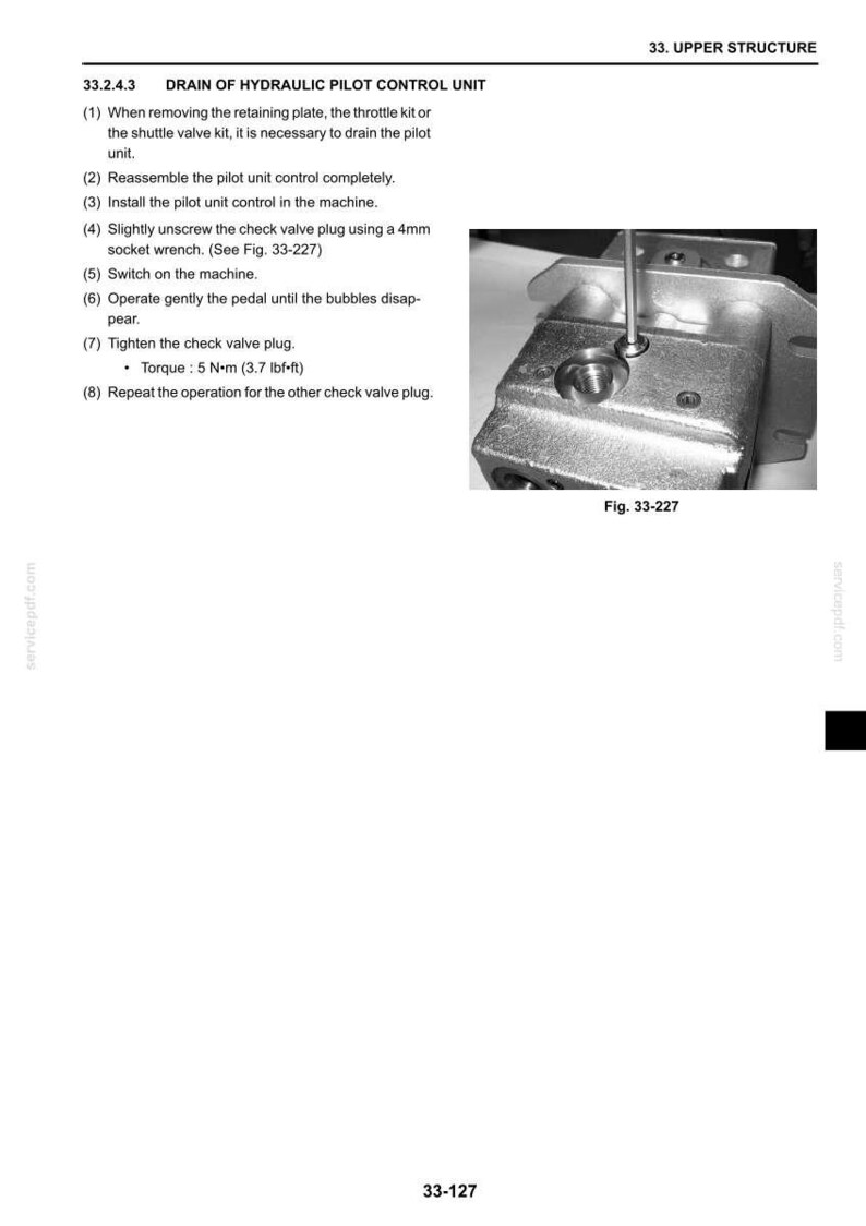 May include: A technical manual page titled 33. UPPER STRUCTURE, 33.2.4.3 DRAIN OF HYDRAULIC PILOT CONTROL UNIT. It includes an 8-step instruction list and a black and white photograph labeled Fig. 33-227 showing a metal tool unscrewing a check valve plug.