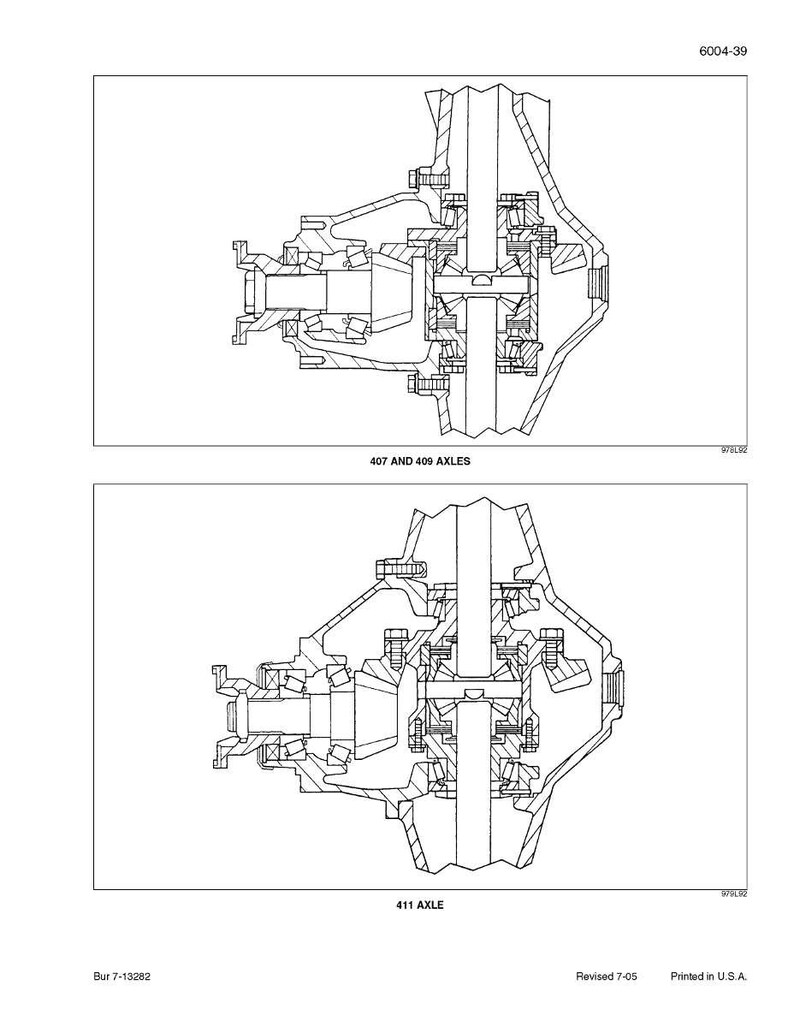 May include: Technical diagram of 407 and 409 axles and 411 axle. The diagrams are black and white line drawings, showing the internal components of the axles. The text "407 AND 409 AXLES" and "411 AXLE" are included.