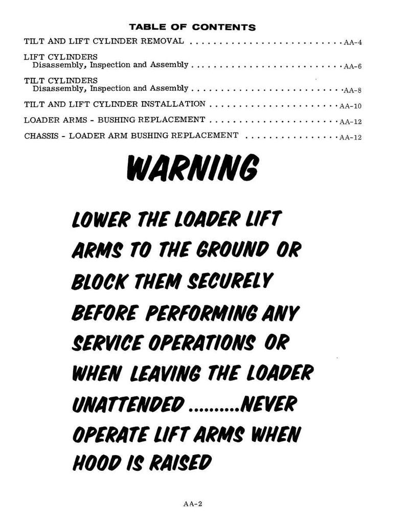 May include: A white page with black text detailing safety warnings and a table of contents for a loader. The word "WARNING" is prominently displayed. Instructions include lowering lift arms and never operating them with the hood raised.