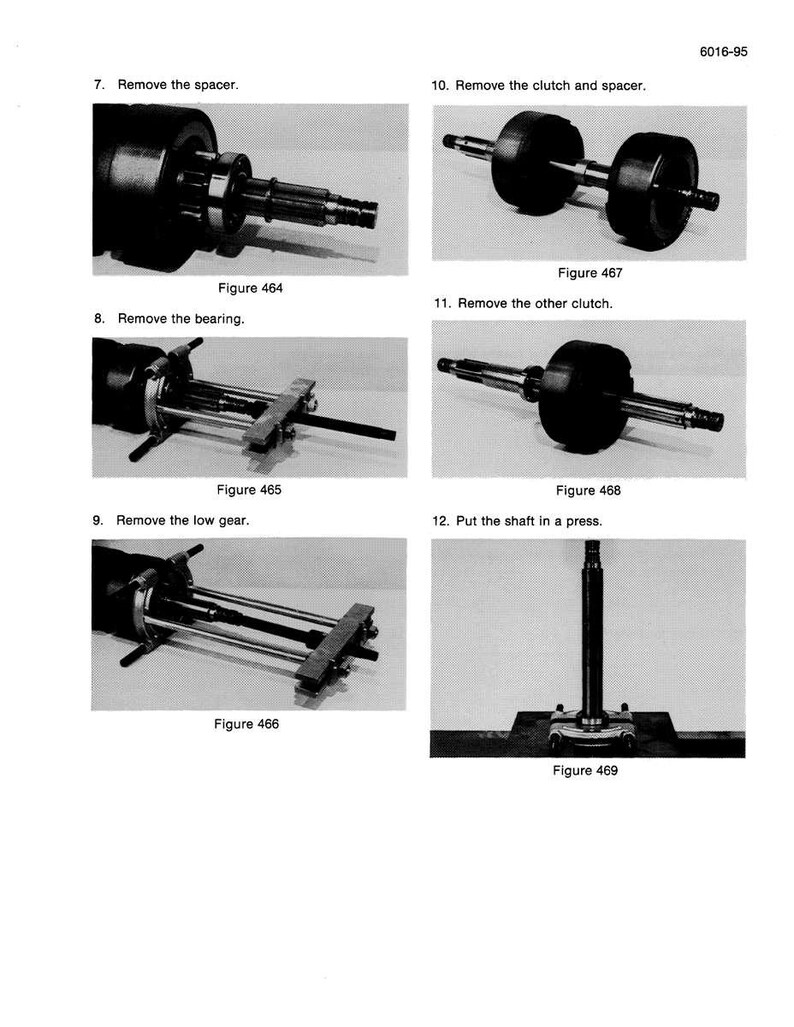 May include: A technical diagram with multiple illustrations detailing mechanical disassembly steps. The images show various components, including gears, bearings, and shafts, with accompanying text labels such as "Remove the spacer" and "Remove the bearing."