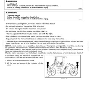 May include: Technical diagram detailing machine towing procedures, including safety warnings and instructions. The image features an illustration of the machine, emphasizing key components and safety guidelines for recovery transport.