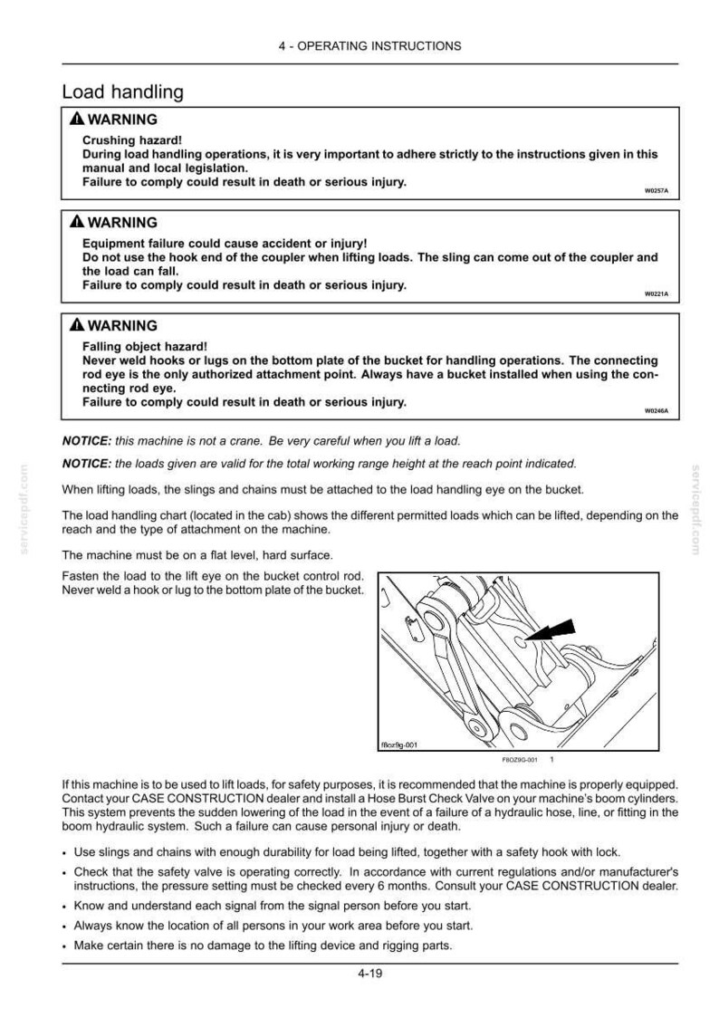 May include: A page from an operating manual with safety warnings about load handling. The text includes warnings about crushing hazards, equipment failure, and falling objects. An illustration shows a machine component with an arrow.