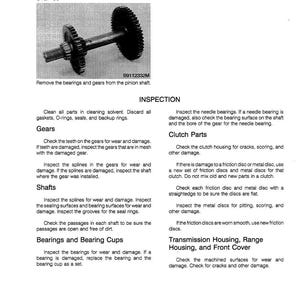 May include: An exploded diagram of a pinion shaft assembly, featuring a central shaft with gears and splines. The image includes text detailing inspection steps for gears, shafts, and bearings, with instructions for wear and damage assessment.