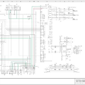 May include: A detailed electrical schematic diagram for a 1021F Tier 4 wheel loader. The diagram features numerous lines, symbols, and text annotations in black, red, and green on a white background. The schematic includes various components and wiring connections.
