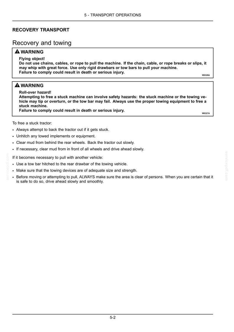 May include: A technical document page titled 5 - TRANSPORT OPERATIONS, Recovery and towing. It contains two warning boxes regarding flying objects and roll-over hazards, followed by bulleted instructions on how to free a stuck tractor safely.