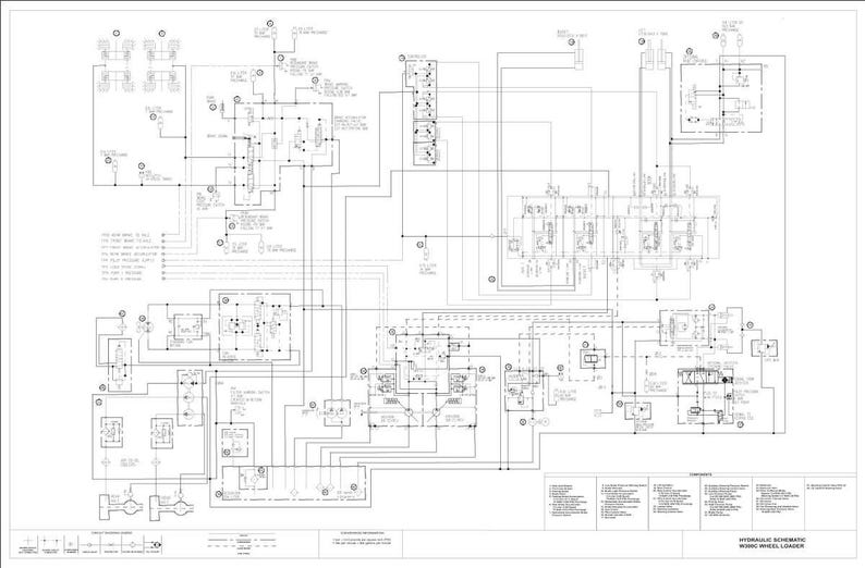 May include: A detailed engineering schematic of a hydraulic system for a wheel loader, rendered in black and white. The diagram features numerous interconnected components, lines, and labels, providing a technical overview of the machinery's functionality.