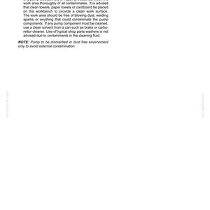 May include: A white document with the title "Pump - Prepare - Work surface" detailing instructions for hydraulic pump maintenance. The text advises cleaning the work area and using clean solvents. The document includes a note about dismantling the pump in a dust-free environment.